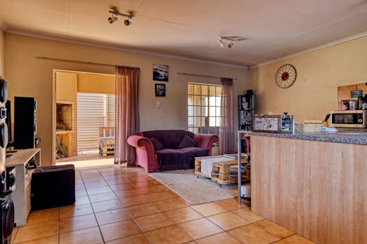 Warm and inviting living room setup with modern decor and rustic elements in Pretoria, South Africa.
