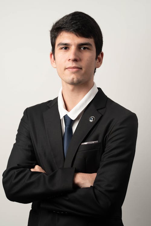 A young man in a suit and tie