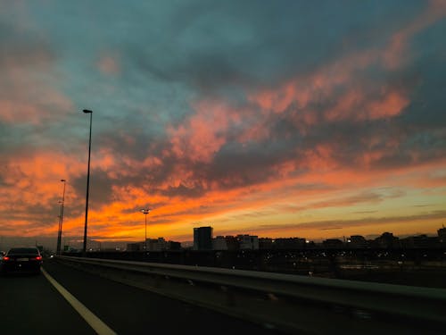 Foto stok gratis atardecer, langit oranye, matahari terbenam