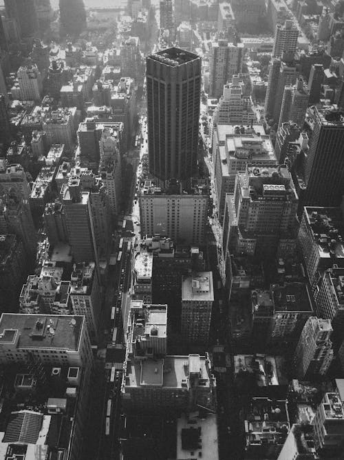 Black and white photo of a city from the top of a building