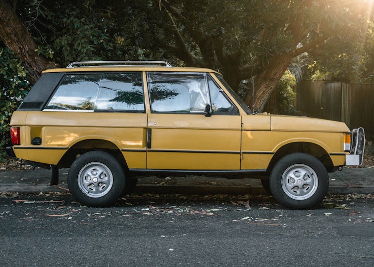 Photo Of Parked Yellow SUV