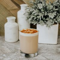 Creamy spiced latte in a glass tumbler, photo by Jared Kaeb on Pexels