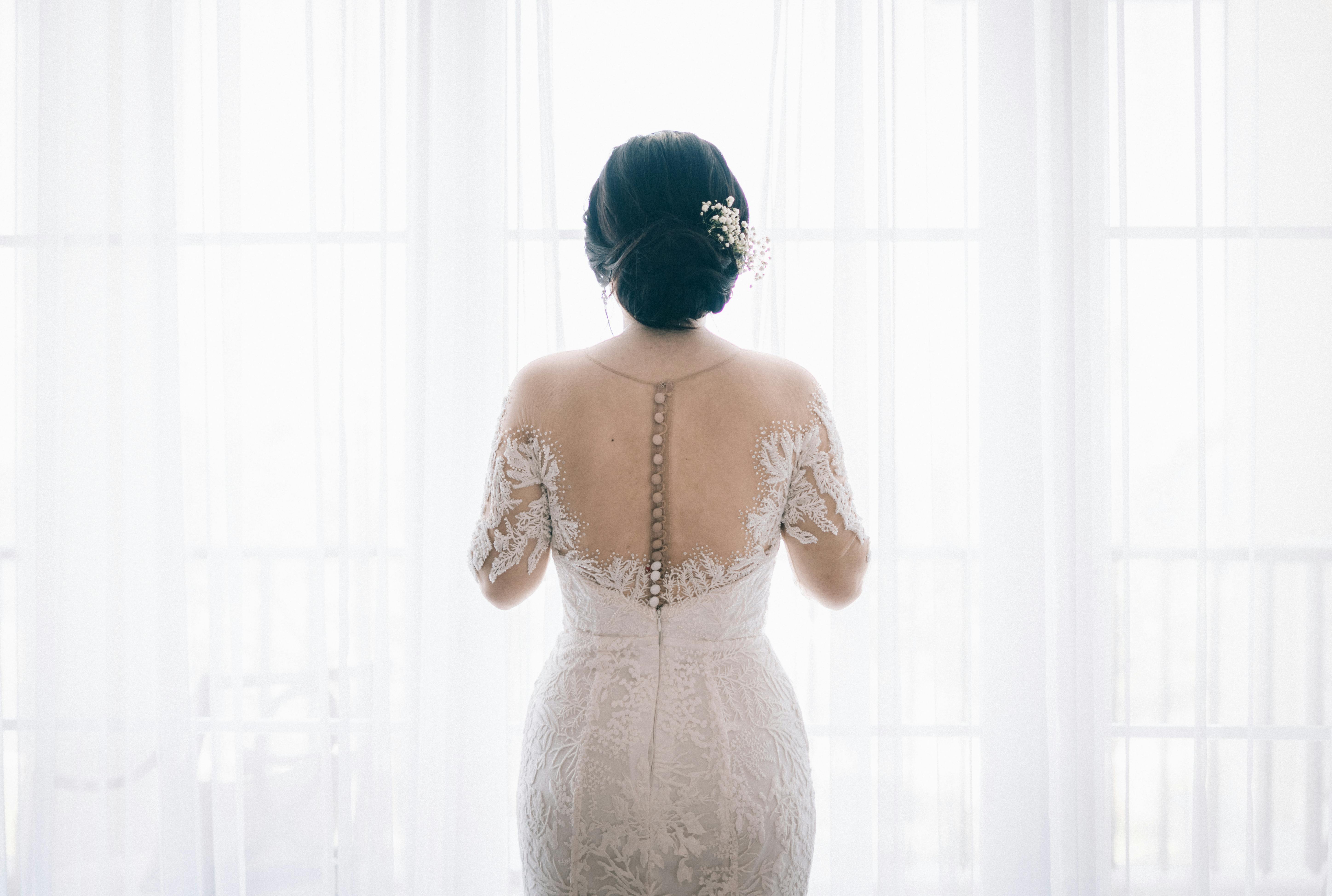 Woman Wearing White Lace Wedding Dress Near White Curtain \u00b7 Free Stock Photo