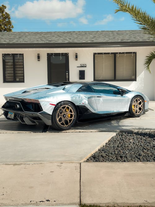 A Lamborghini Aventador Parked on the Driveway 