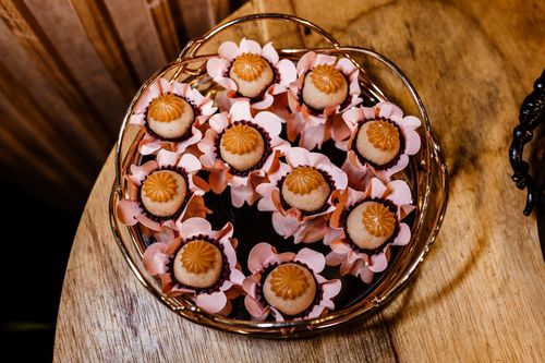 Free Indulgent chocolate treats arranged artfully on a tray for a gourmet experience. Stock Photo