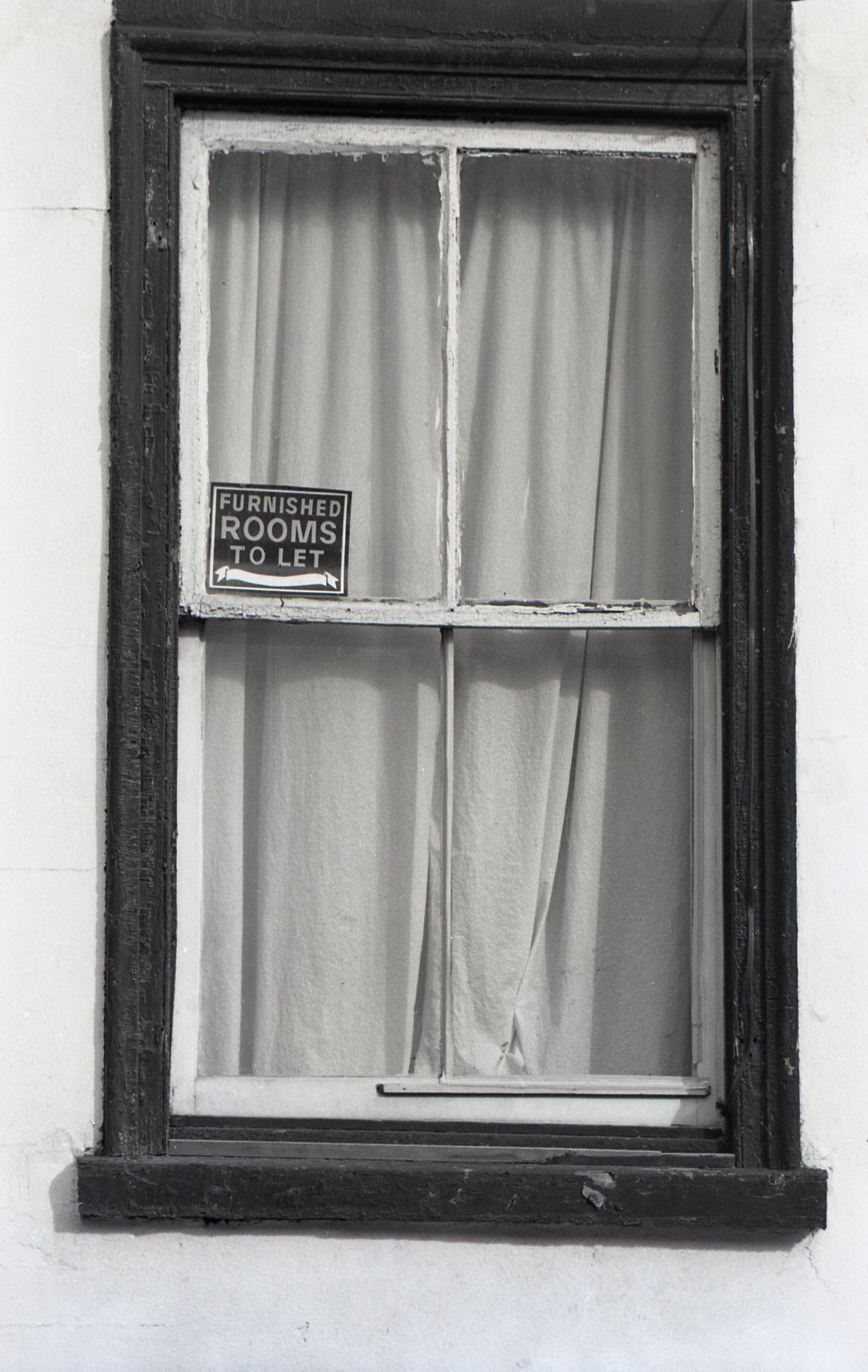 advertisment board on window