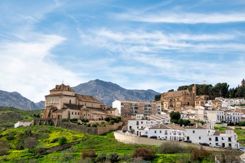 Free Beautiful landscape view of Antequera, Spain featuring Del Carmen Church and surrounding buildings. Stock Photo
