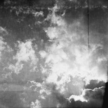 Monochromatic image of dramatic clouds in a classic film style.