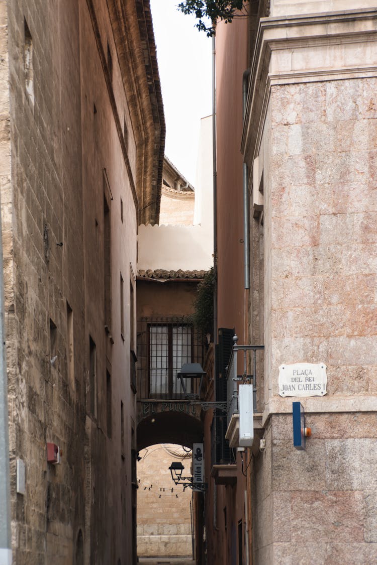 Narrow Alley Between Medieval Buildings