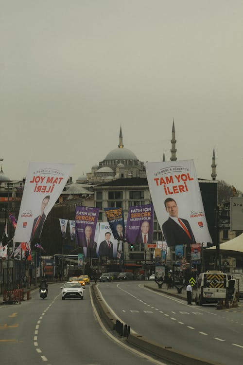 A city street with billboards on it