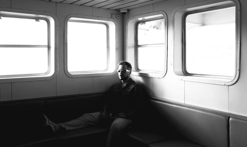 A man sits alone on a ferry in Istanbul — photo by Furkan Elveren on Pexels