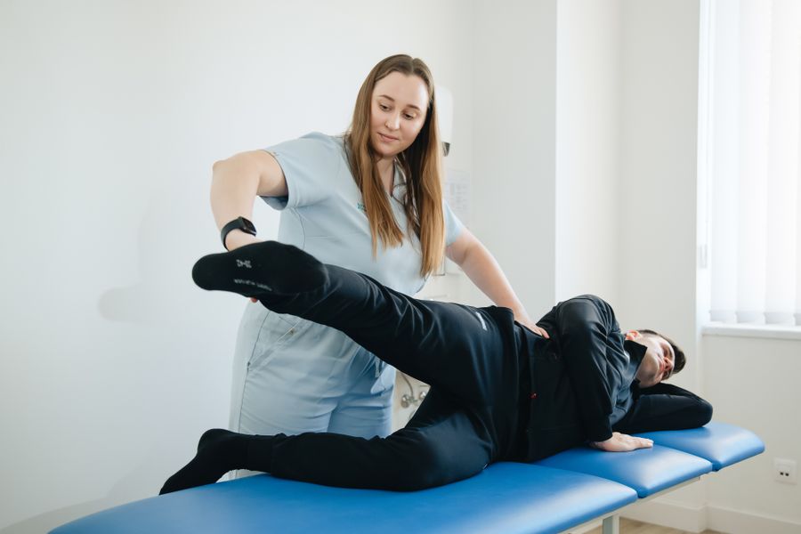 Patient in physiotherapy session after knee arthroscopy