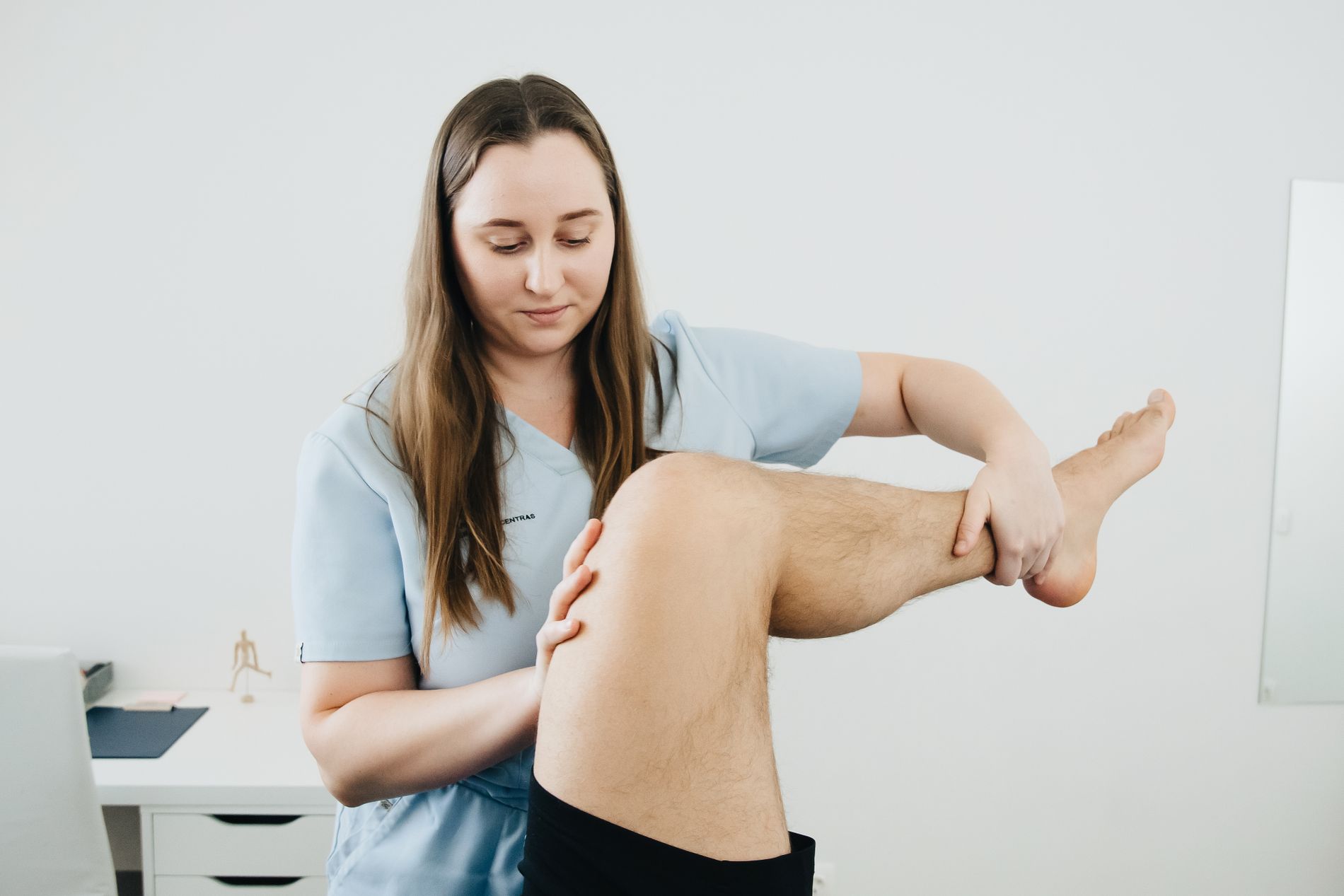 Physical therapy session supporting recovery after a workplace injury