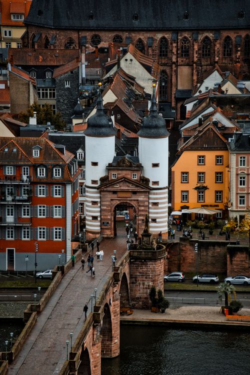 Free Aerial view of Heidelberg's historic Old Bridge and city gate, showcasing gothic architecture. Stock Photo