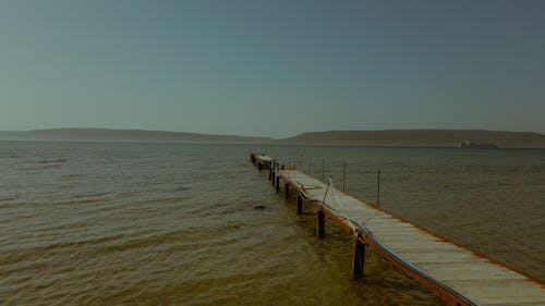 Kostenloses Stock Foto zu am strand, blaues meer, boot