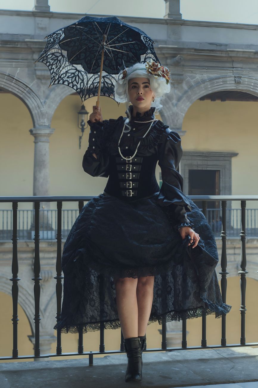 Victorian fashion portrait with elegant black dress and vintage umbrella in a historic Mexican location.. pexels, victorian,