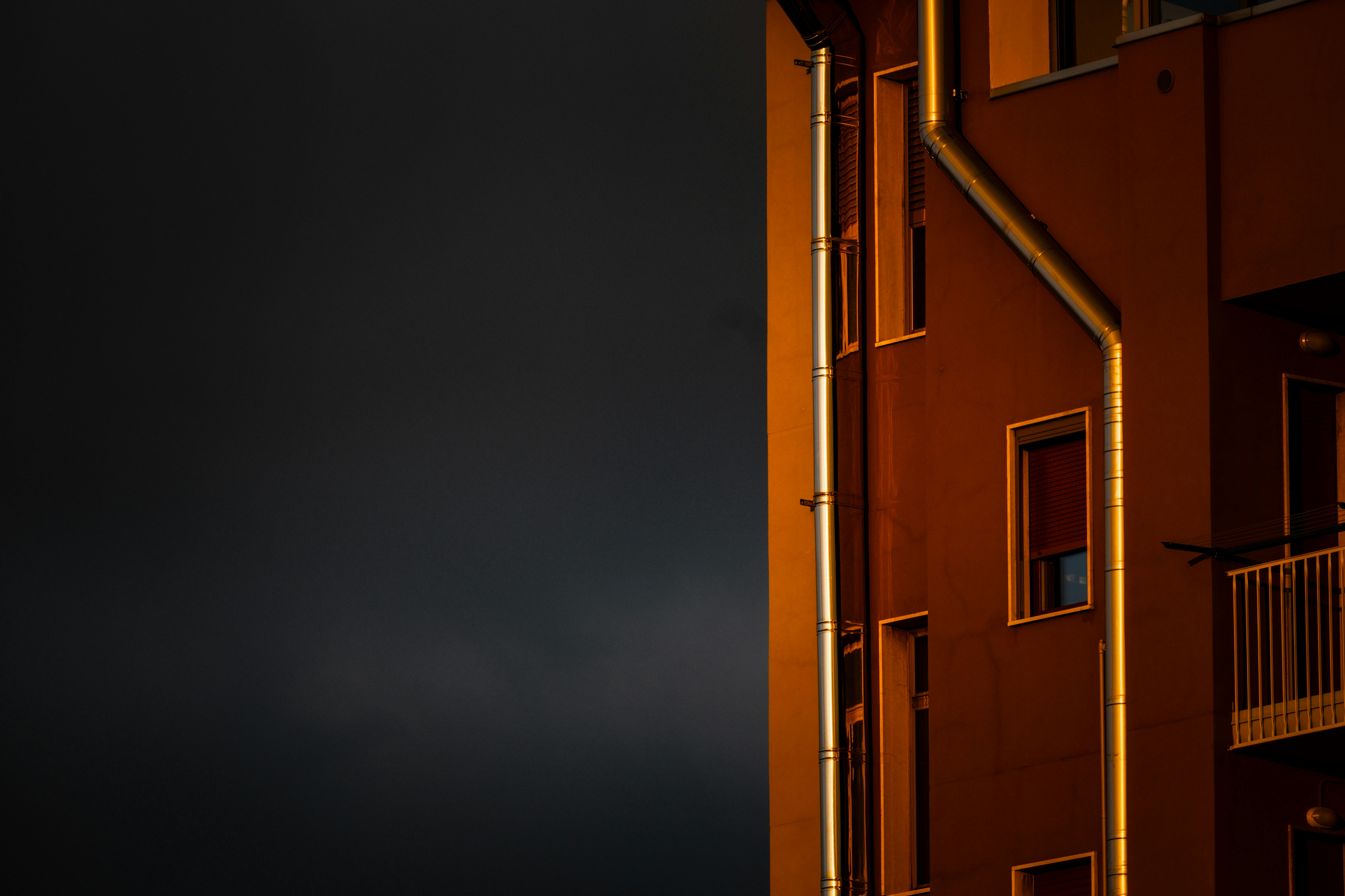 Gutters on Block of Flats Wall