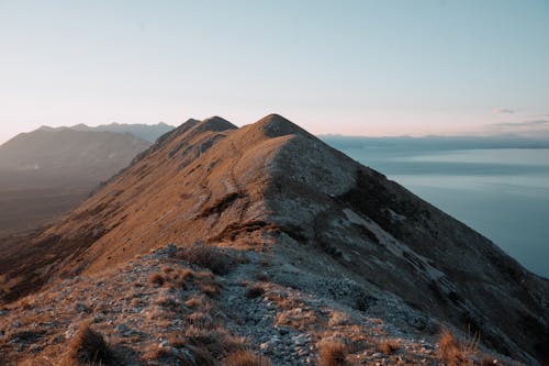 Free stock photo of brown mountain, hike, hiker