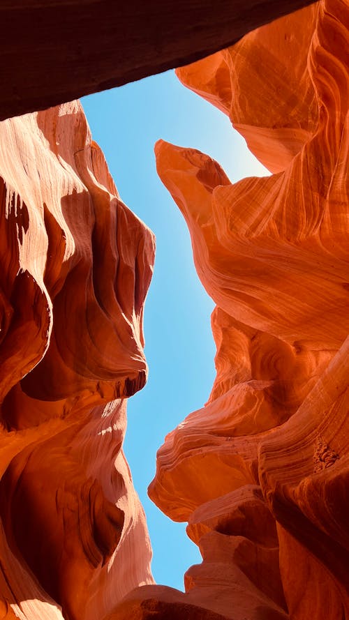 A photo of a canyon with a blue sky