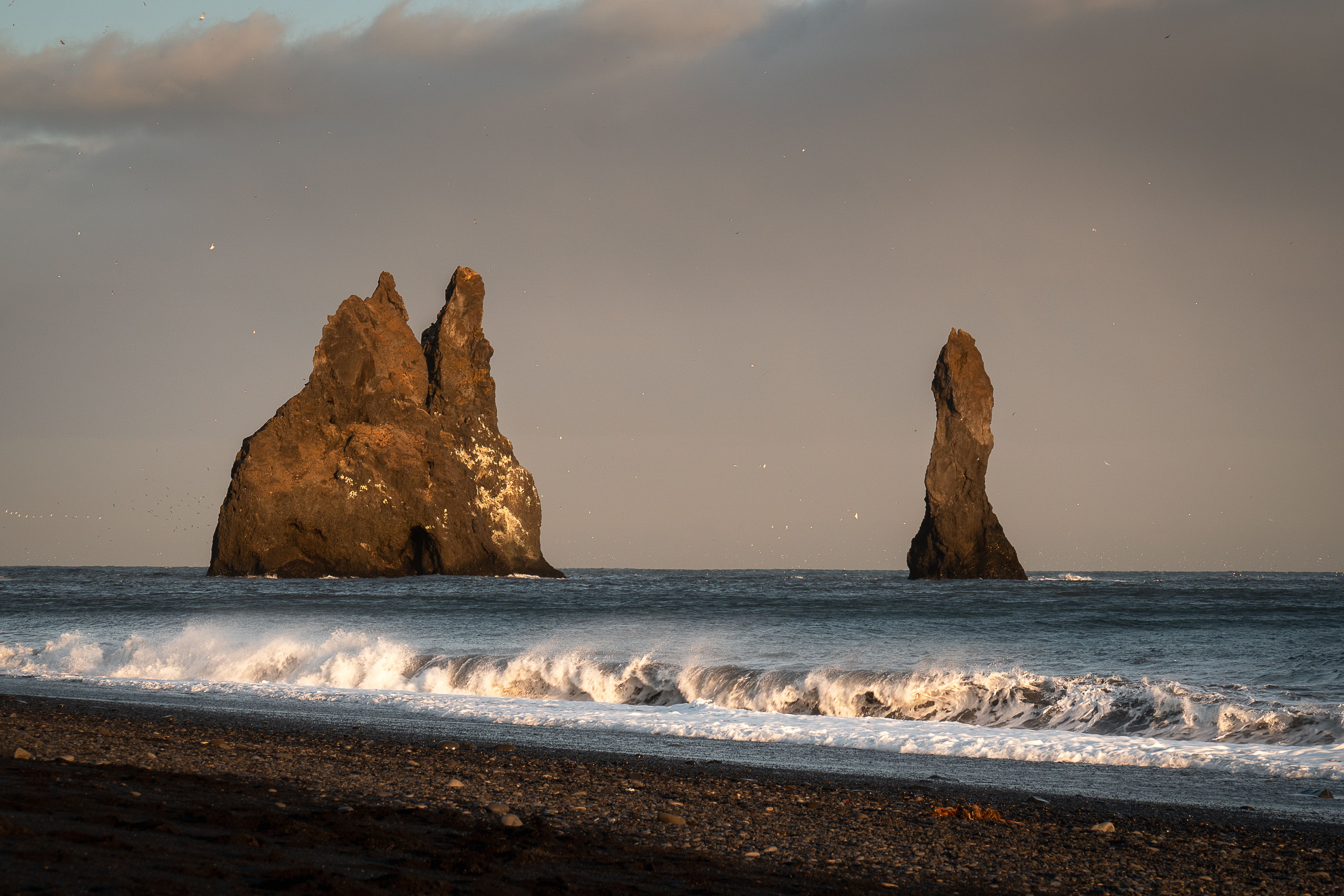 View of Rock Formations and Waves Washing Up the Reynisfjara Beach