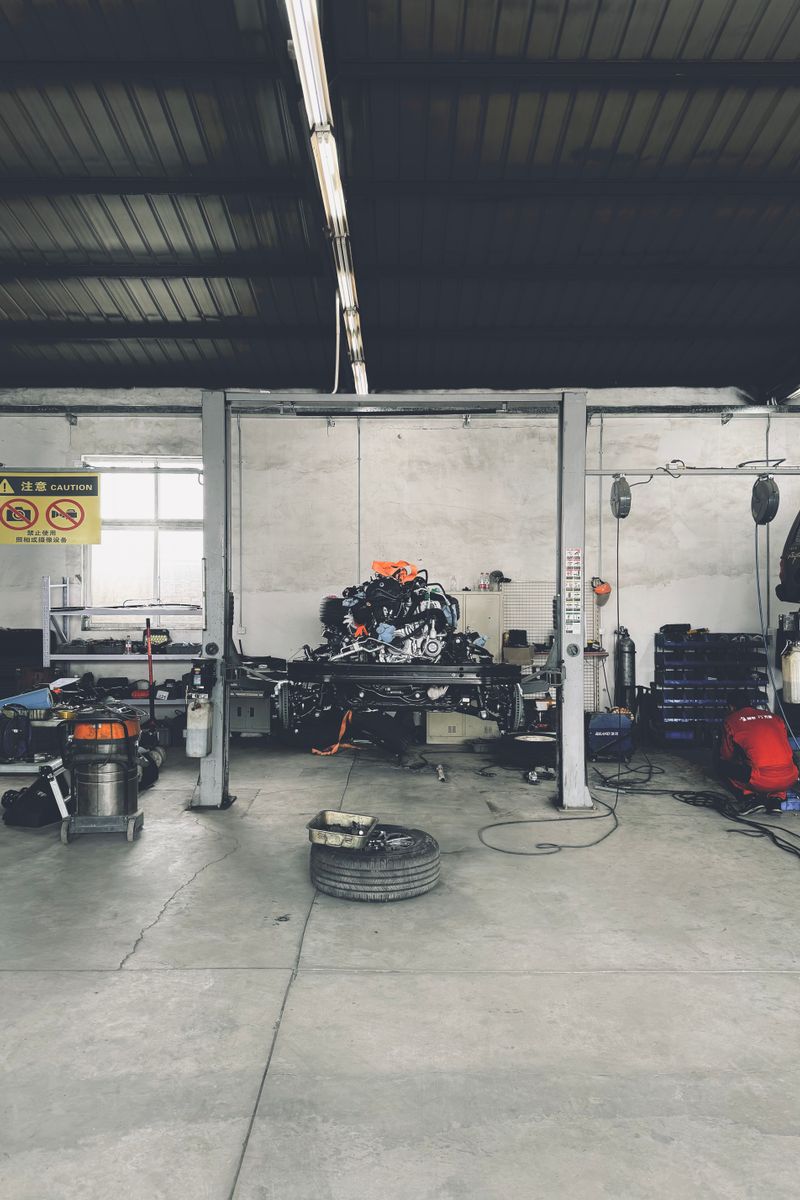 Efficient auto repair workshop with organized tools and machinery setup in Beijing.