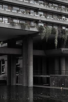 Explore the iconic Brutalist architecture of London with reflective water features in this urban scene.. pexels, explore, ico