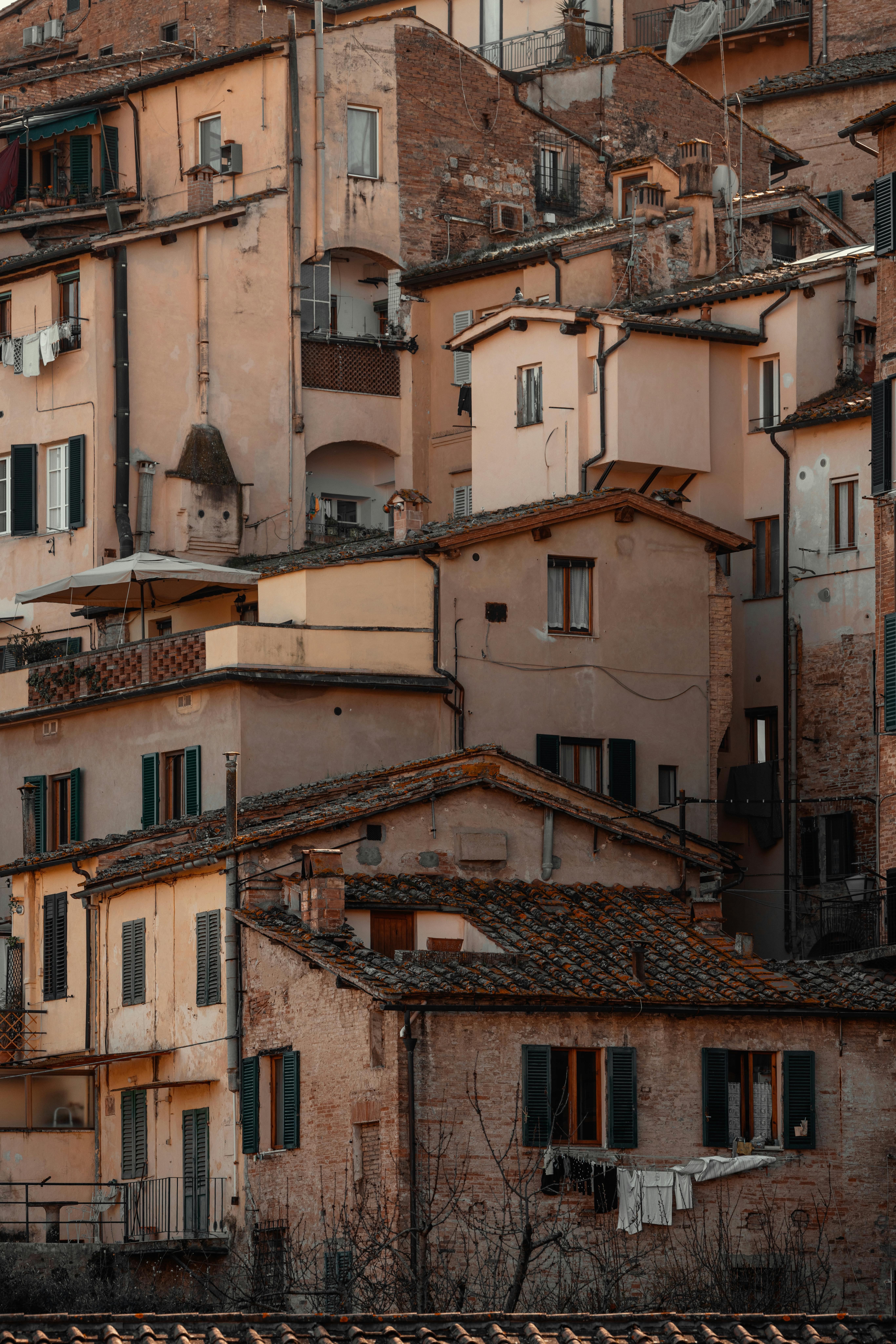 Rustic and dense cityscape featuring charming European residential houses in a compact urban setting.