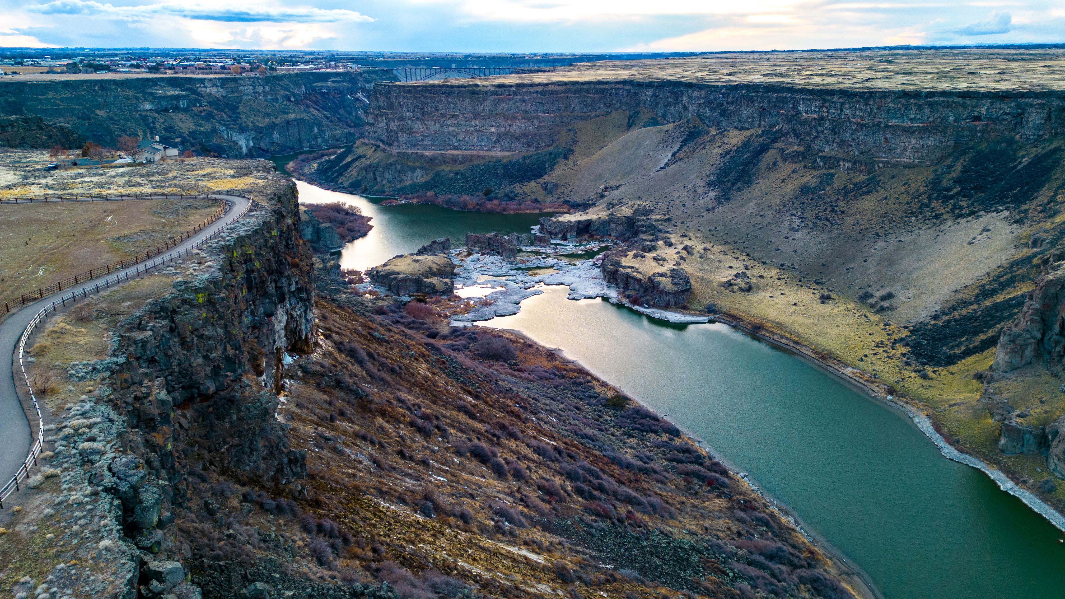 Breathtaking view of rugged canyon with meandering river in Twin Falls, Idaho.