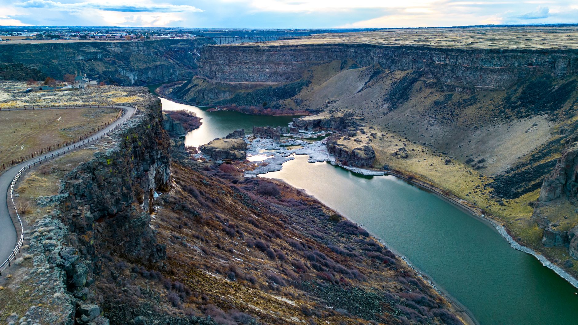 Breathtaking view of rugged canyon with meandering river in Twin Falls, Idaho.