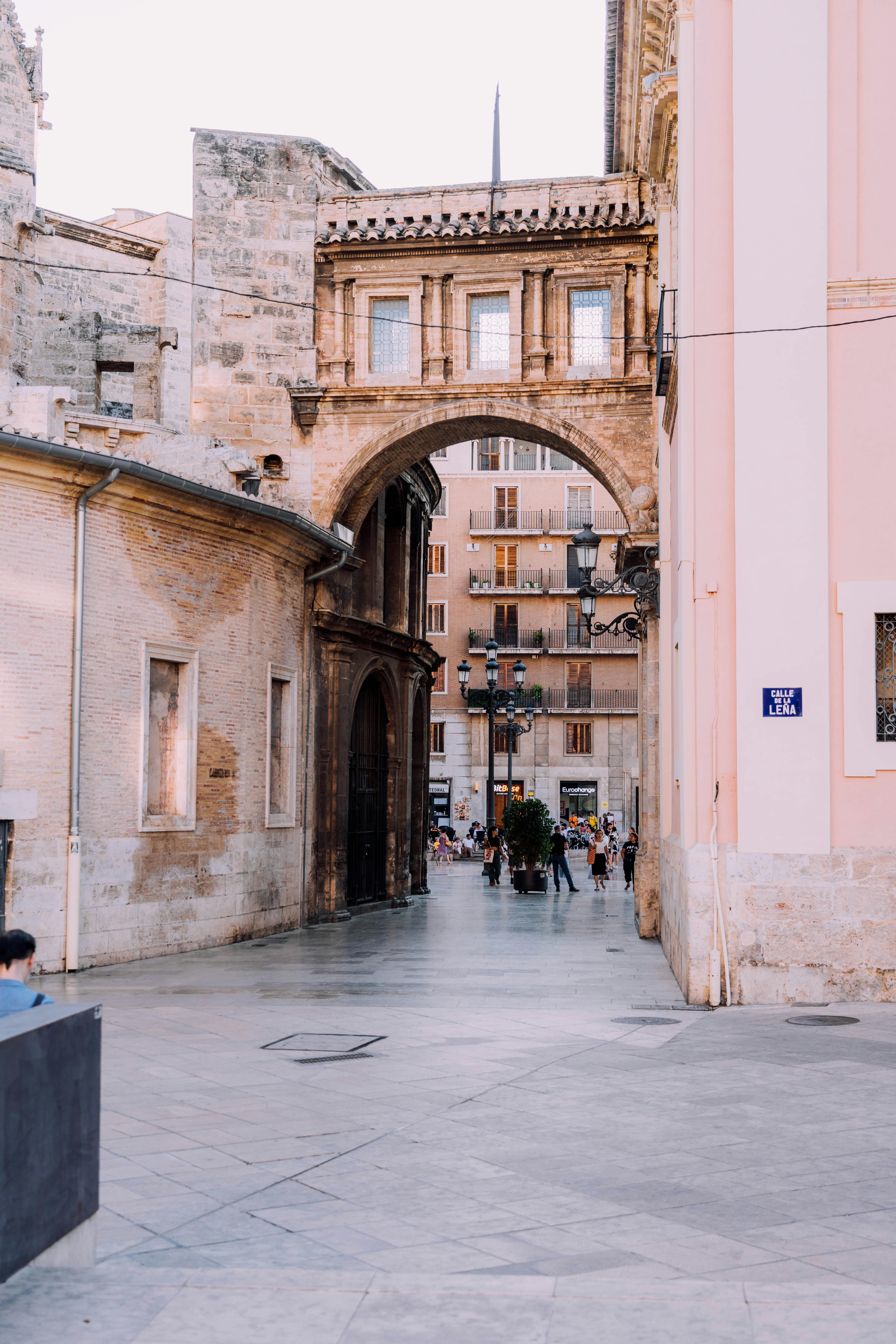 A beautiful archway in Valencia, Spain, showcasing historic architecture and local charm.