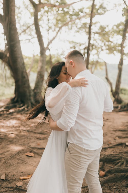 Free Just Married Couple Dancing in a Forest Stock Photo