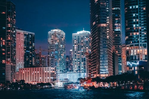 Free stock photo of city, city at night, city on the water