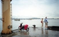 Woman and Man Standing on Seashore in Vietnam
