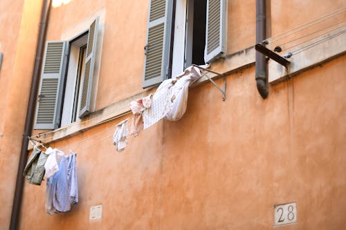 Clothes hanging on a clothesline on a building