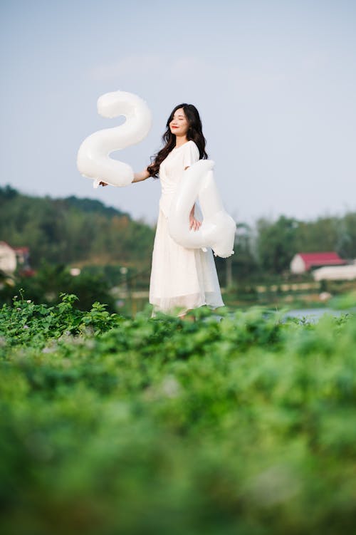 Kostenloses Stock Foto zu asiatische frau, ballons, feier