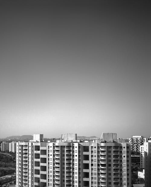 Black and White Photography of Modern City Buildings 