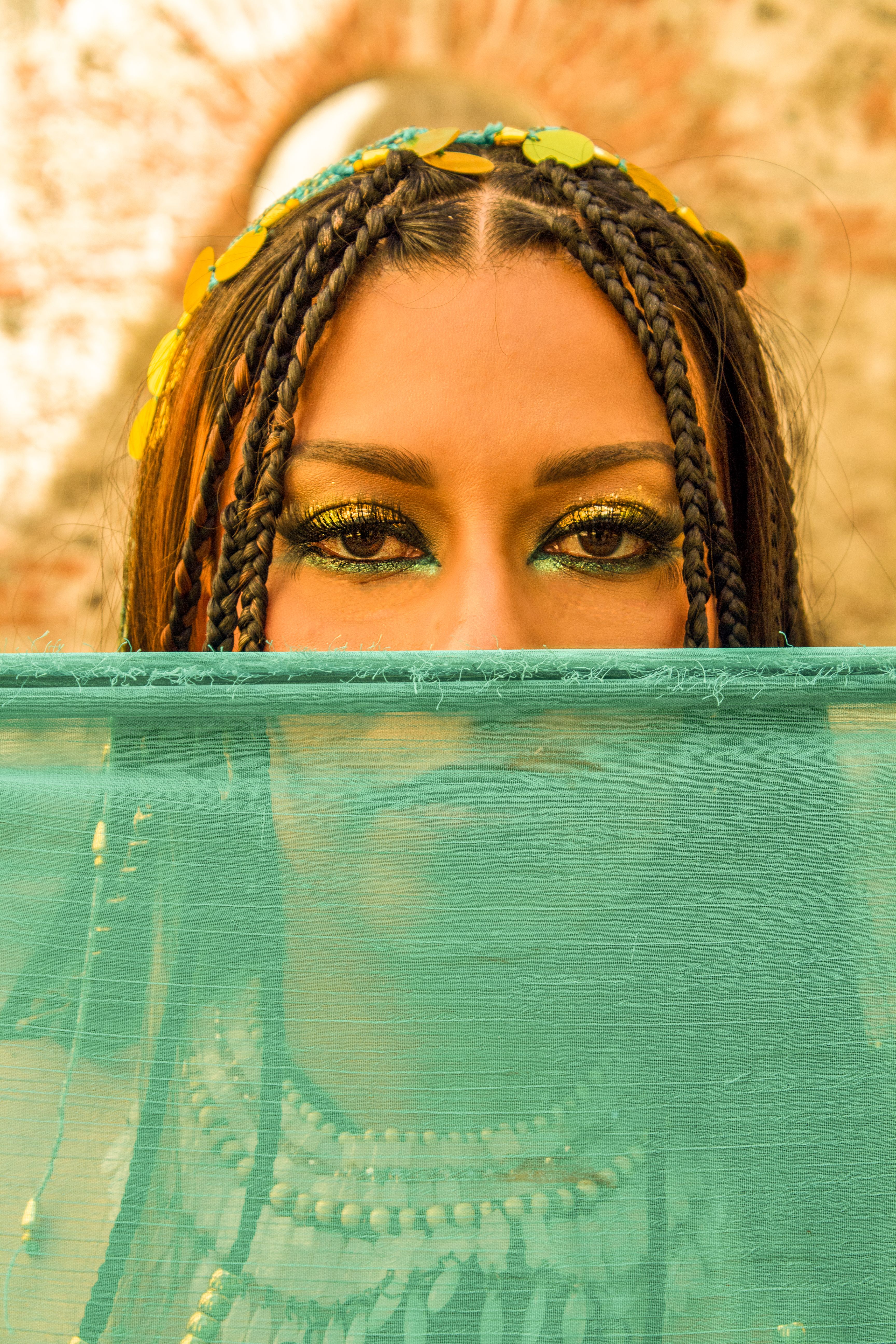 Woman with Makeup and Braided Hair behind Green Veil · Free Stock Photo
