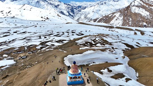 A view of a mountain with snow and people