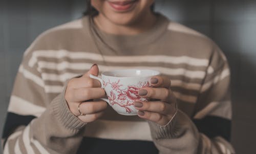 Free Photo of Woman Holding Cup Stock Photo