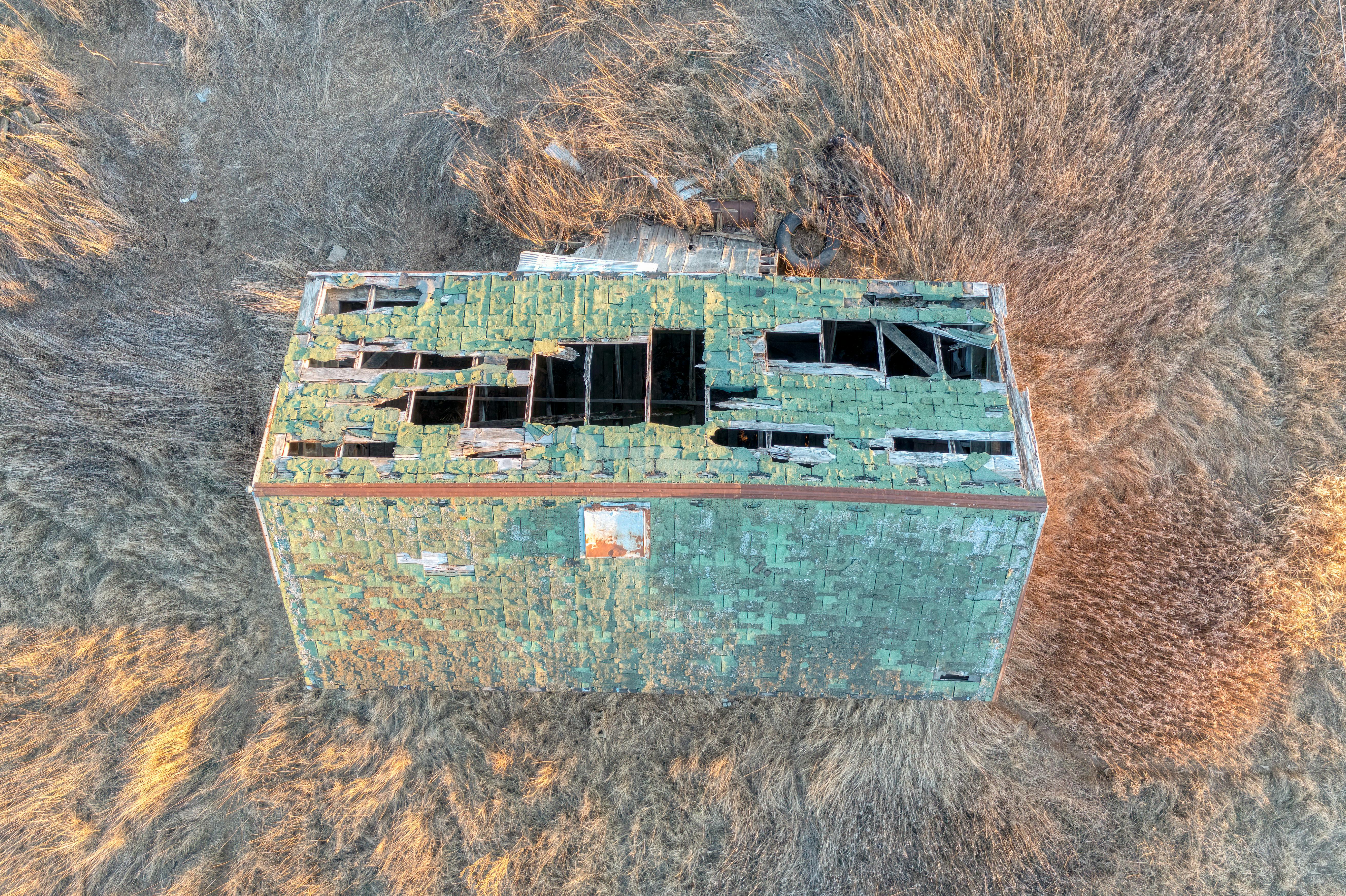 Aerial View of Crumbling Roof of Abandoned Shed