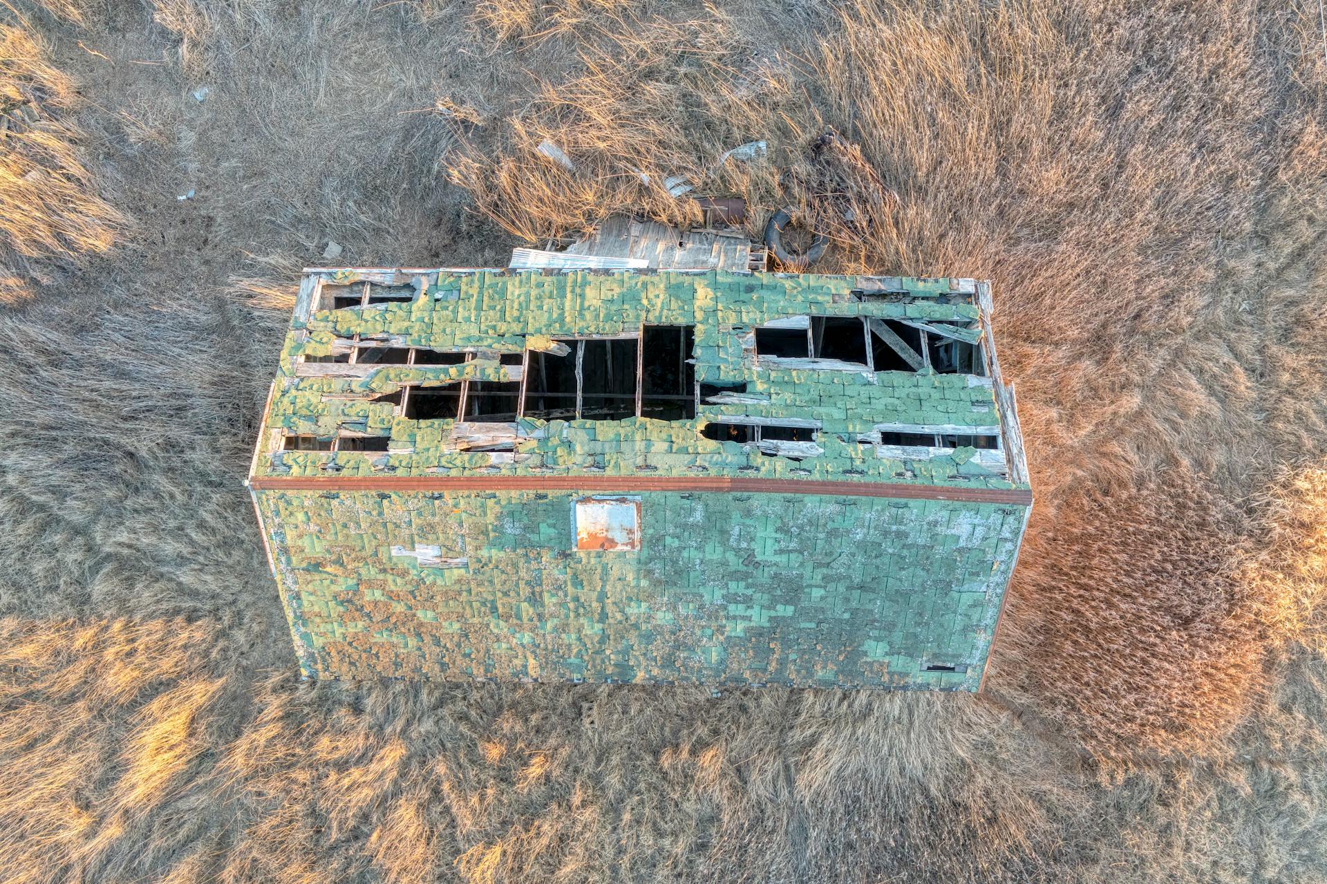 Aerial View of Crumbling Roof of Abandoned Shed