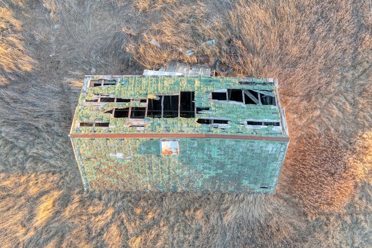 Aerial View Of Crumbling Roof Of Abandoned Shed