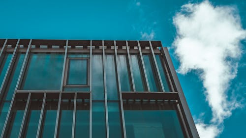 Cloud near Office Building Windows