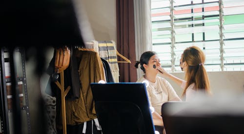 A woman is getting ready for her wedding