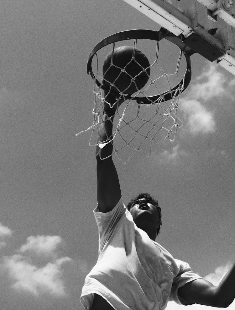 Young Man Playing Basketball