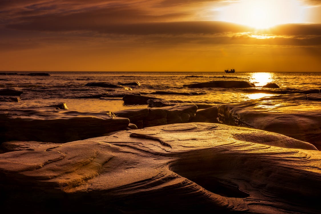 Ilmainen kuvapankkikuva tunnisteilla auringonlasku, hiekkaranta, horisontti