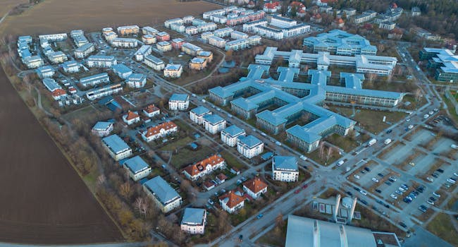 Aerial shot of contemporary urban area in Munich, showcasing architecture and layout.