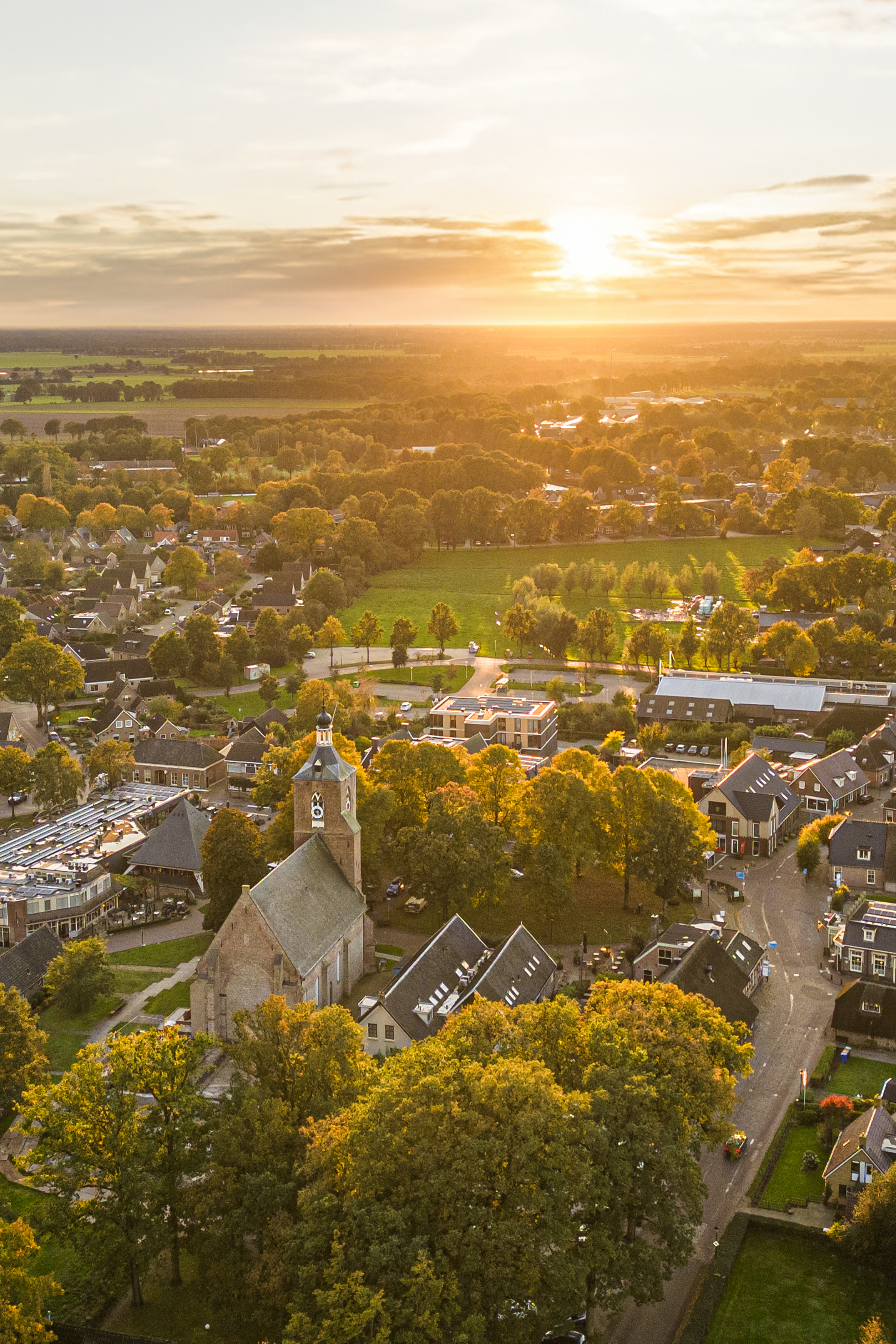 A picturesque aerial view of Ruinen village in the Netherlands during sunset.