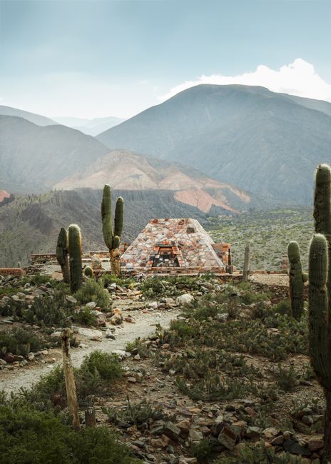 Explore the breathtaking arid landscape of Tilcara, Jujuy, with iconic cacti and mountains.