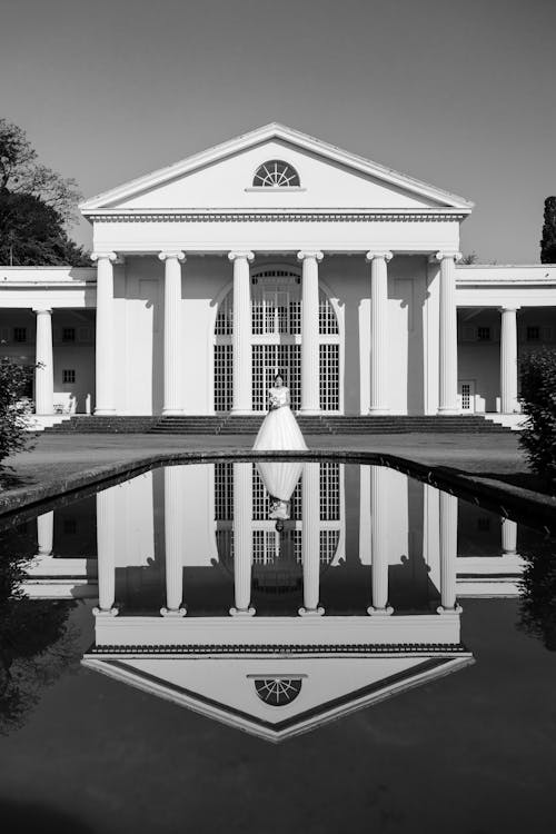 Black and white photograph of a large white building